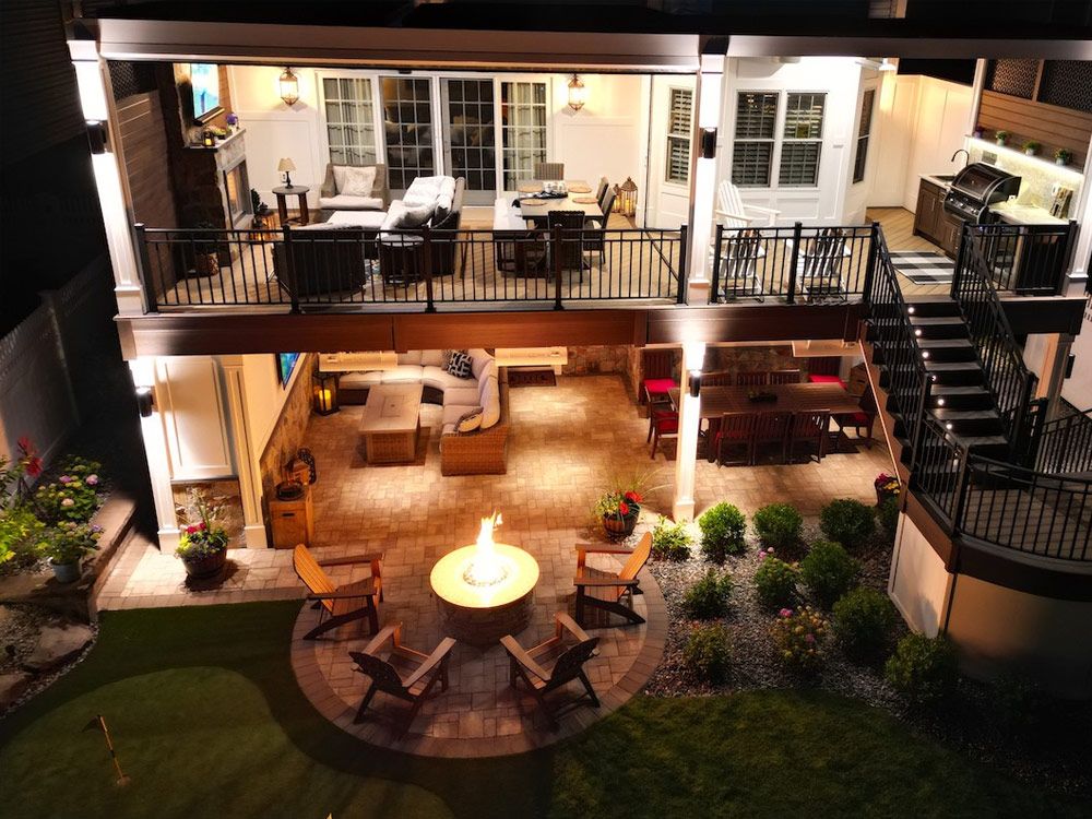 Outdoor dining area and fire pit built by SCPC Construction