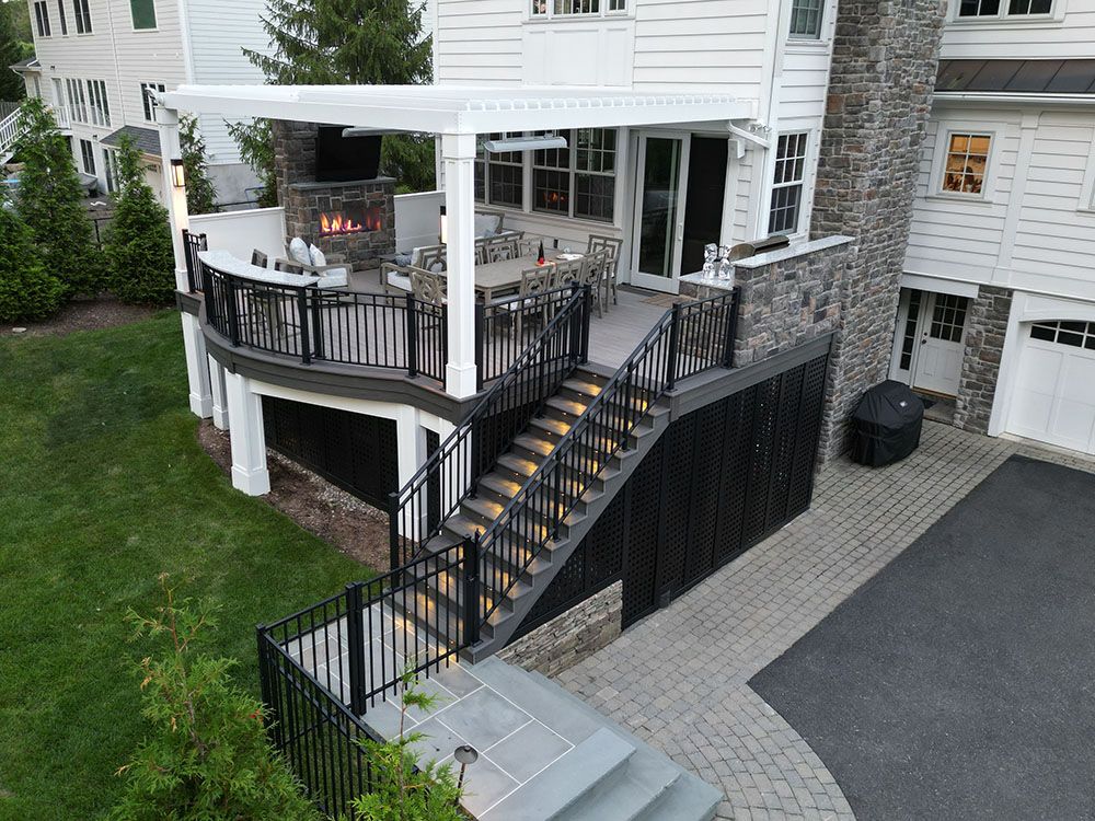 Raised Deck with Custom Stairs by SCPC Construction